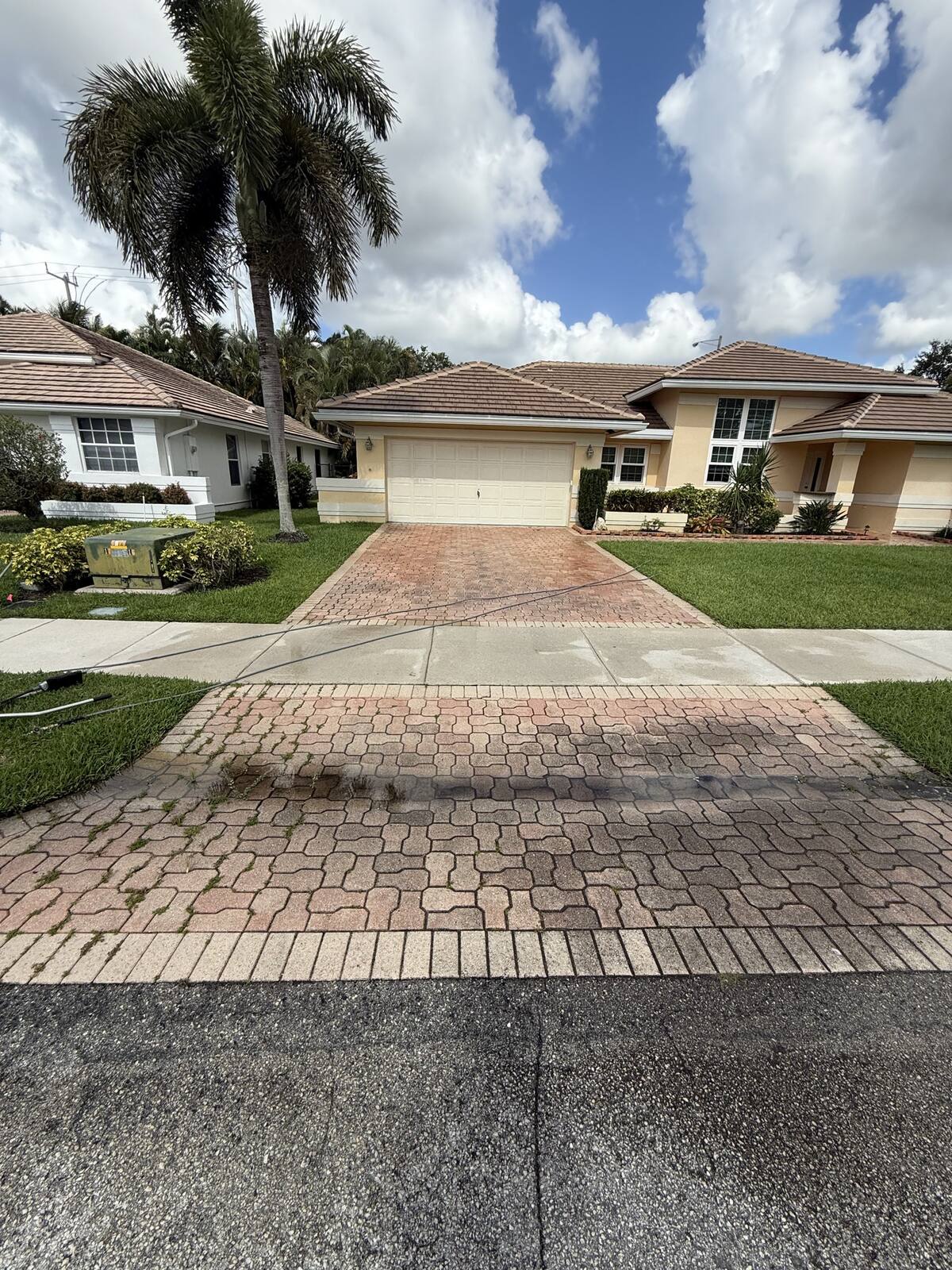 Paver driveway cleaning in Davie, FL — before