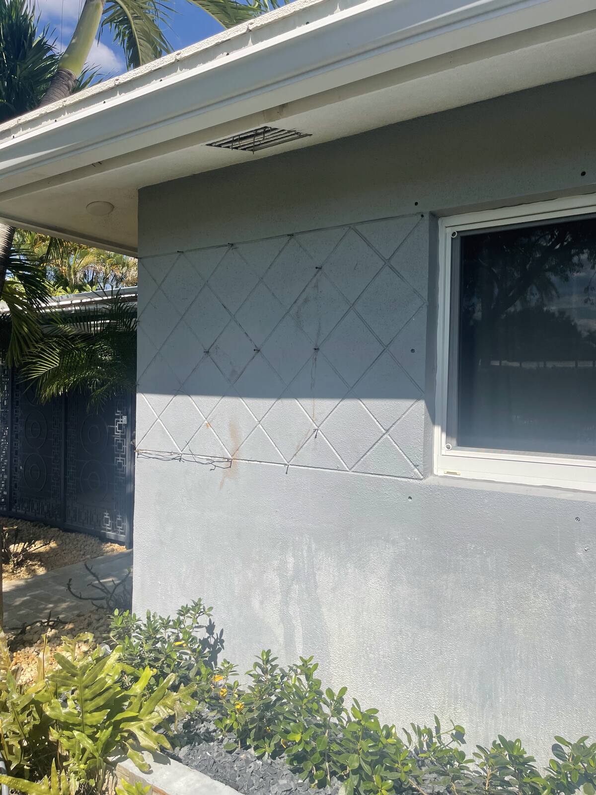 House exterior wall washing in South Florida — after