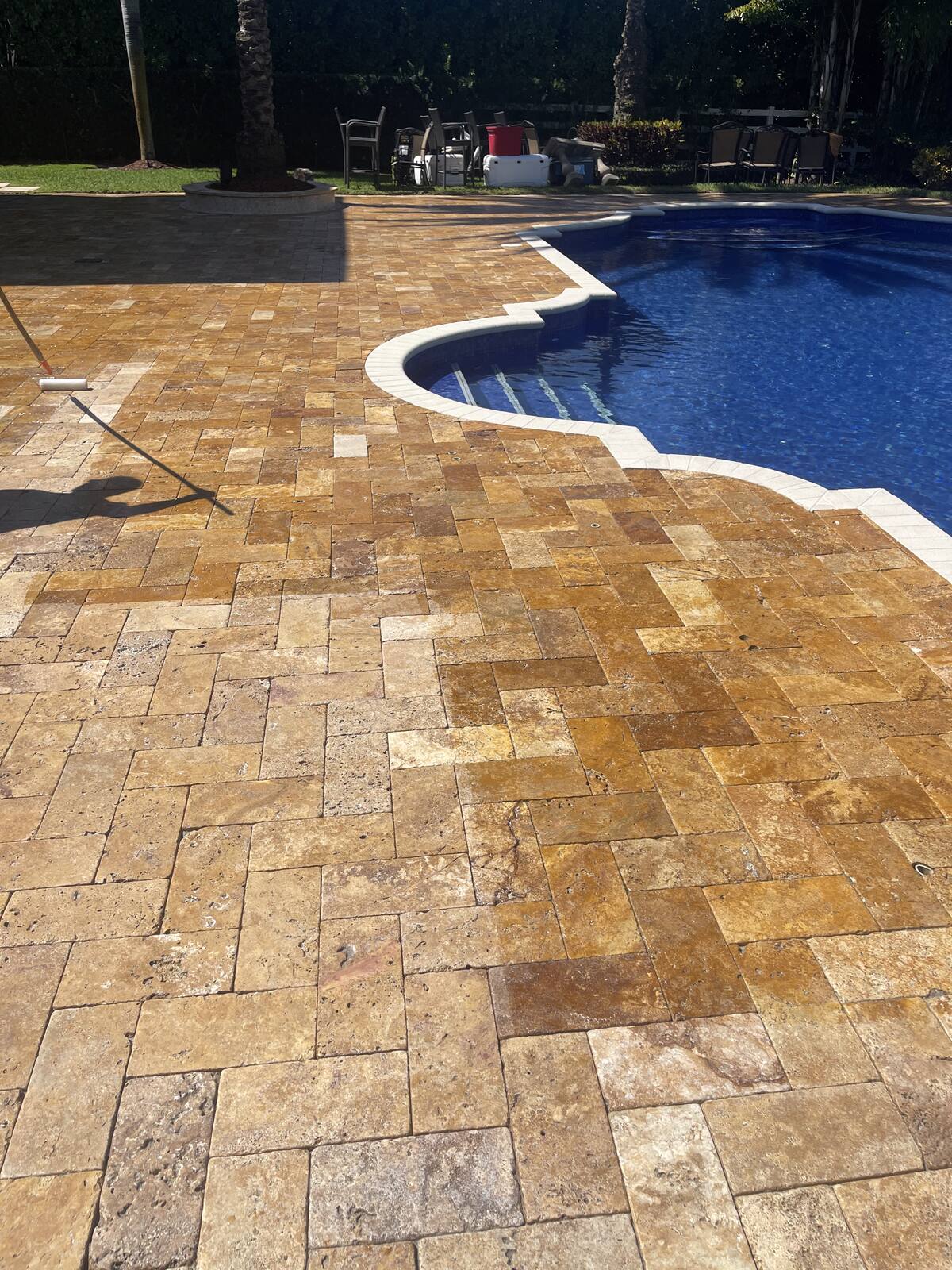 Travertine pool deck cleaning in South Florida — after