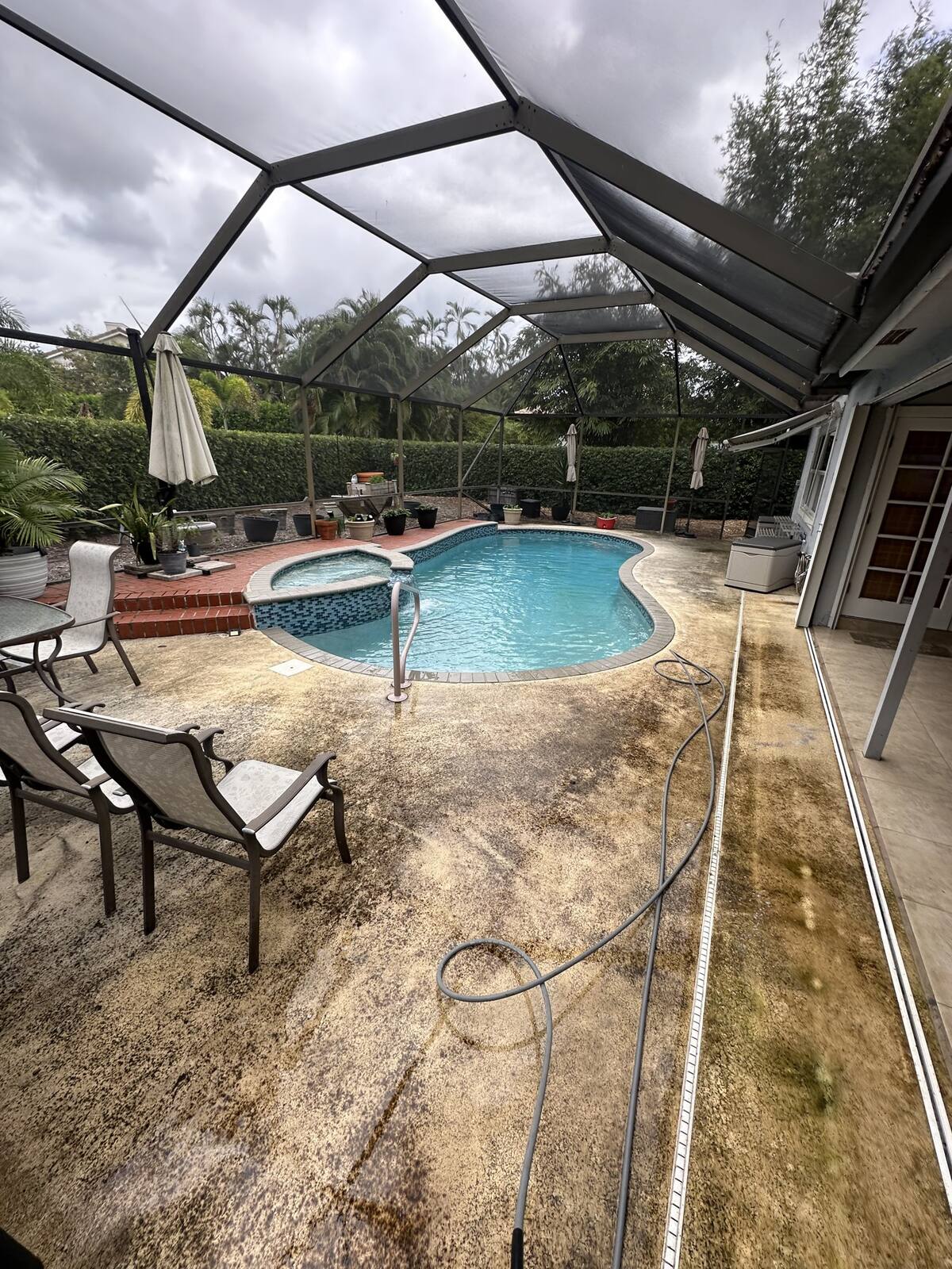 Pool deck cleaning in Pembroke Pines, FL — before