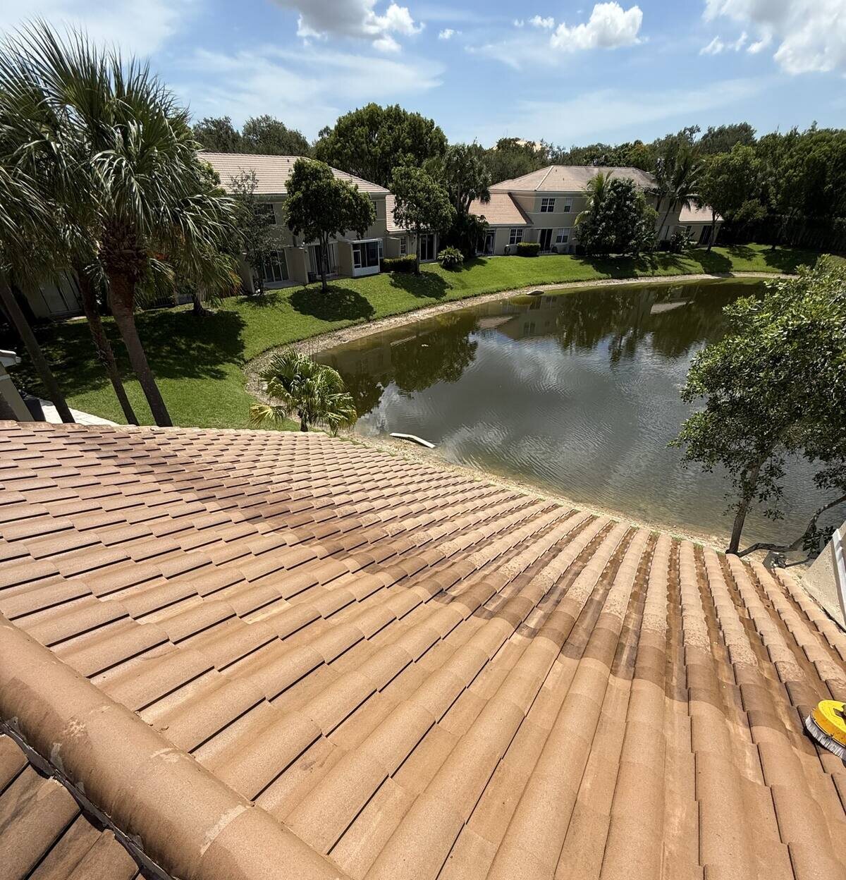 Freshly cleaned tan tile roof in South Florida