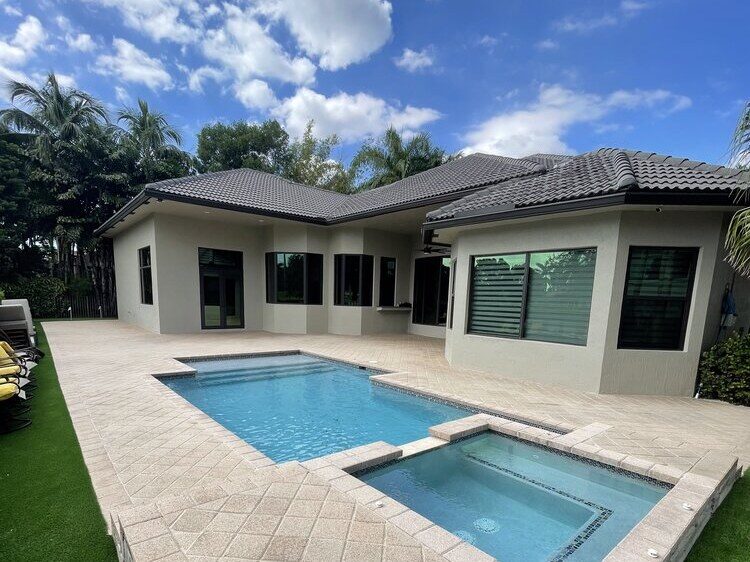 Pool deck and spa sealed and color-restored at a South Florida home — after