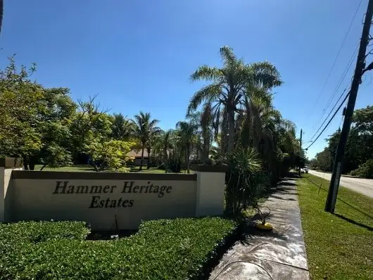 Before HOA entrance sign and sidewalk pressure washing in South Florida