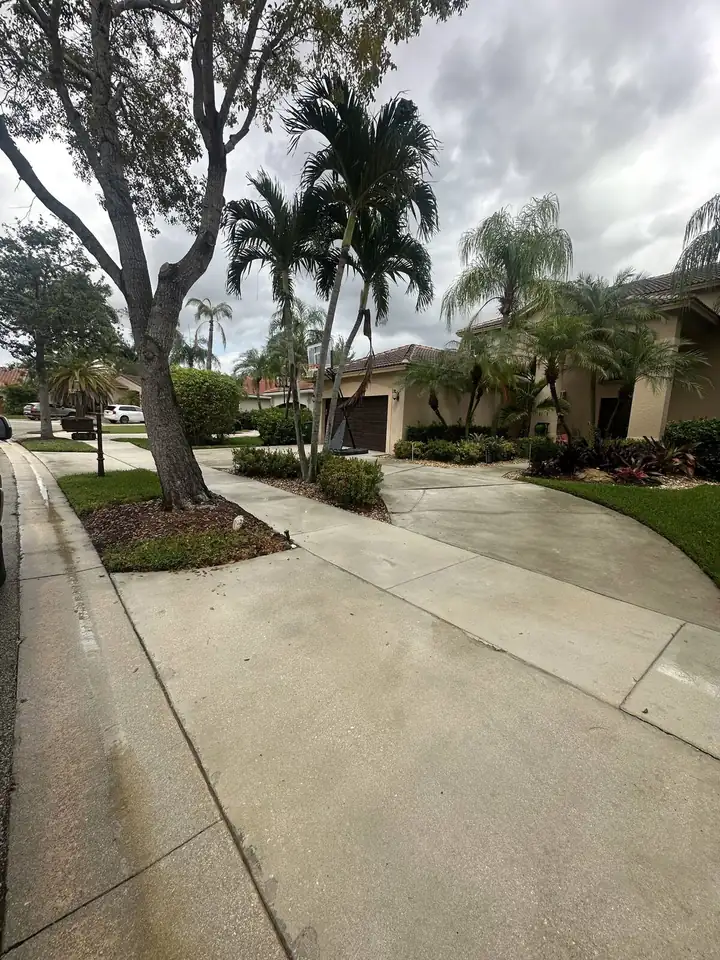 Concrete driveway pressure washing in Davie, FL — after