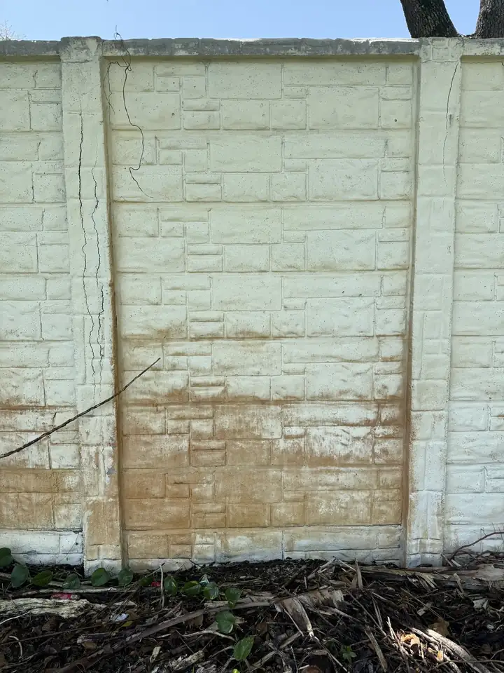 Before rust stain removal from a wall in Davie, FL