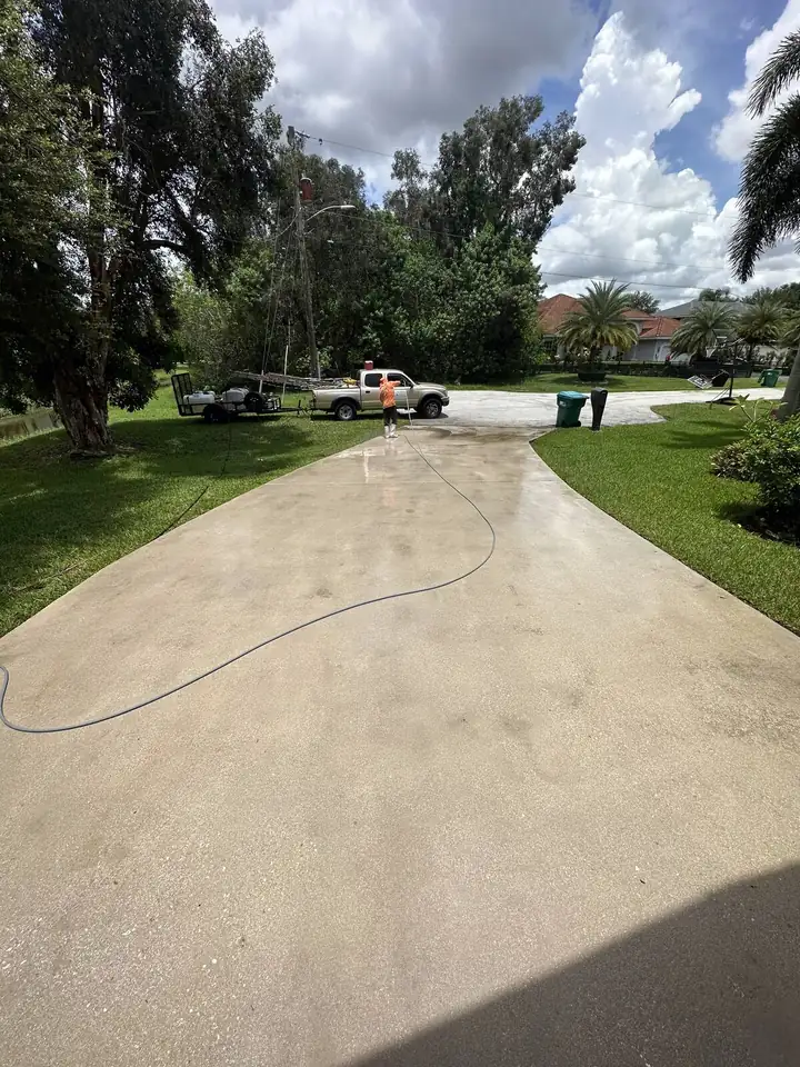 Rust stain removal from a concrete driveway in South Florida — after
