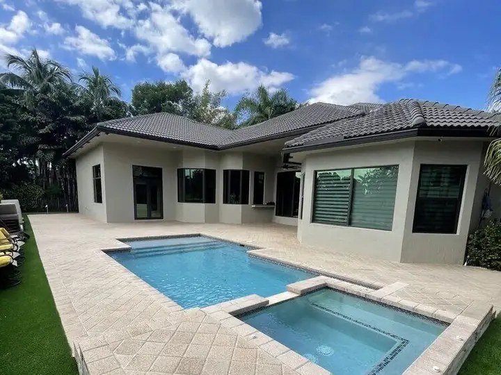 Pool deck and spa sealed and color-restored at a South Florida home — after